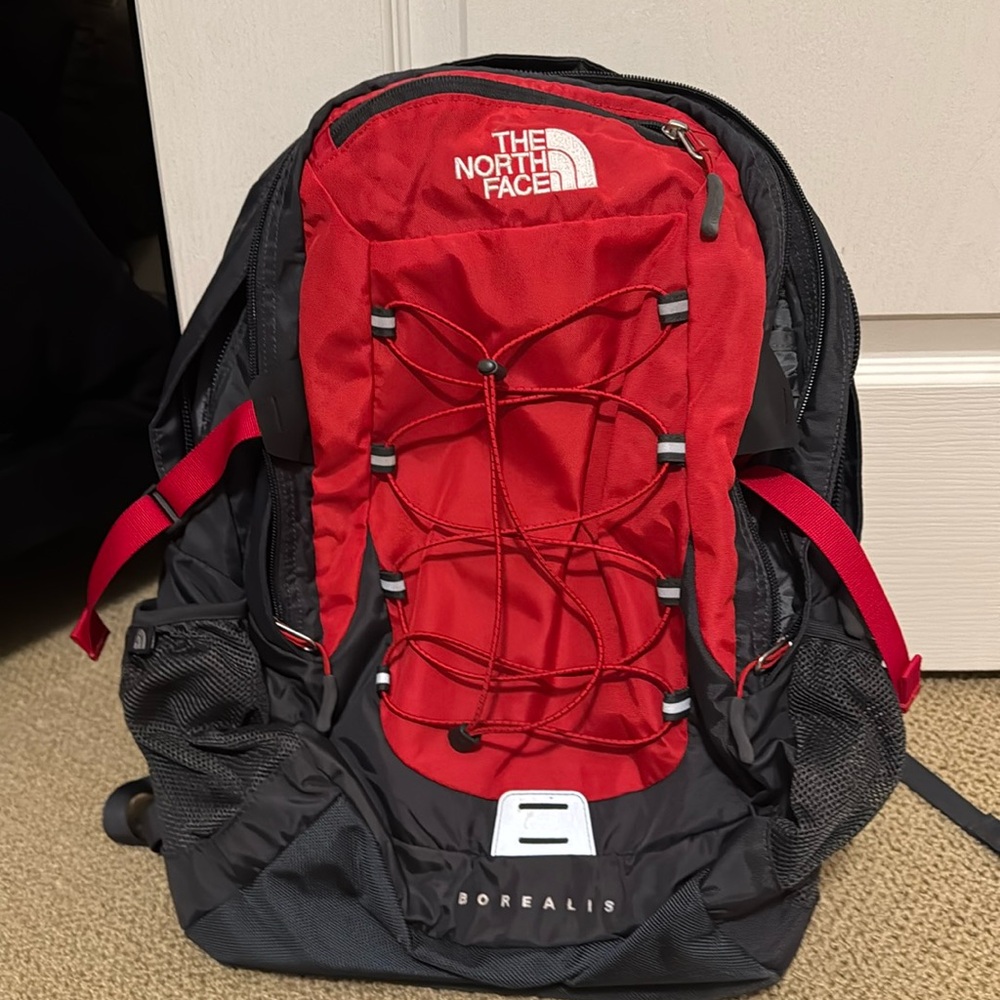 The North Face red backp